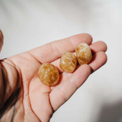 Honigcalcit Trommelsteine