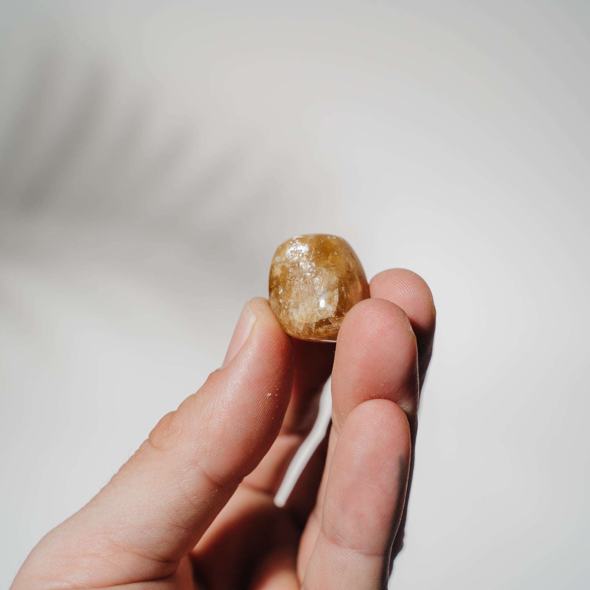 Honigcalcit Trommelsteine